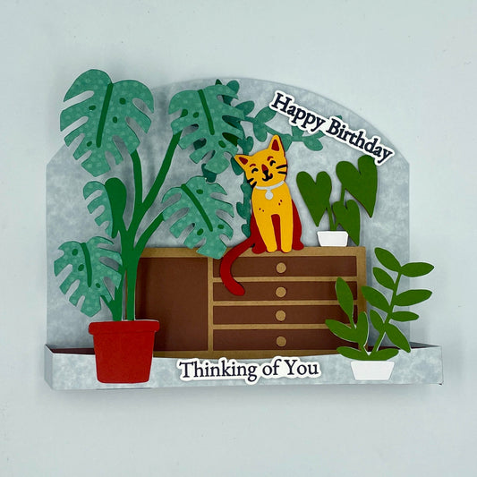 Greeting card with a cat and plants design on a white background