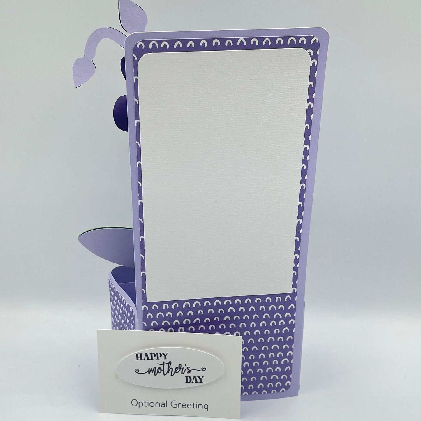 Back of purple box card on a white background