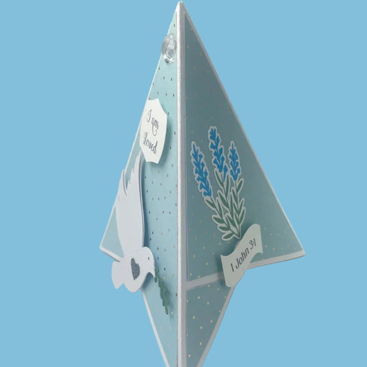 Decorative card with floral design on a blue background