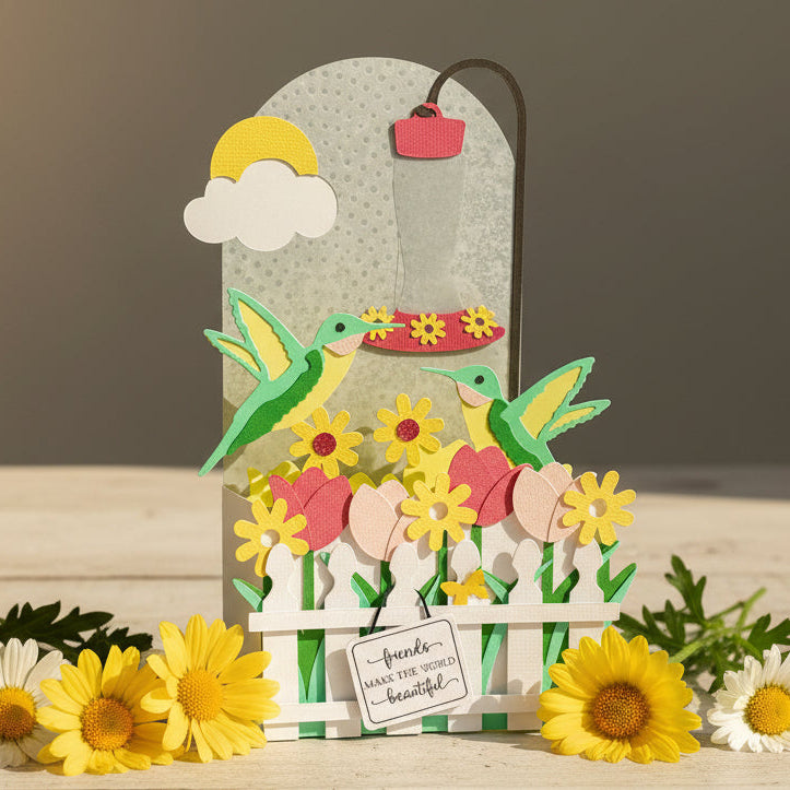 Decorative card with flowers and birds on a wooden surface