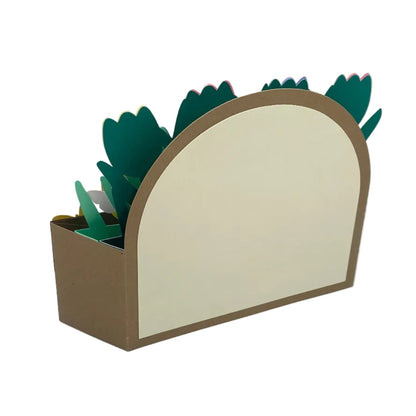 Decorative plant holder with green leaves on a white background