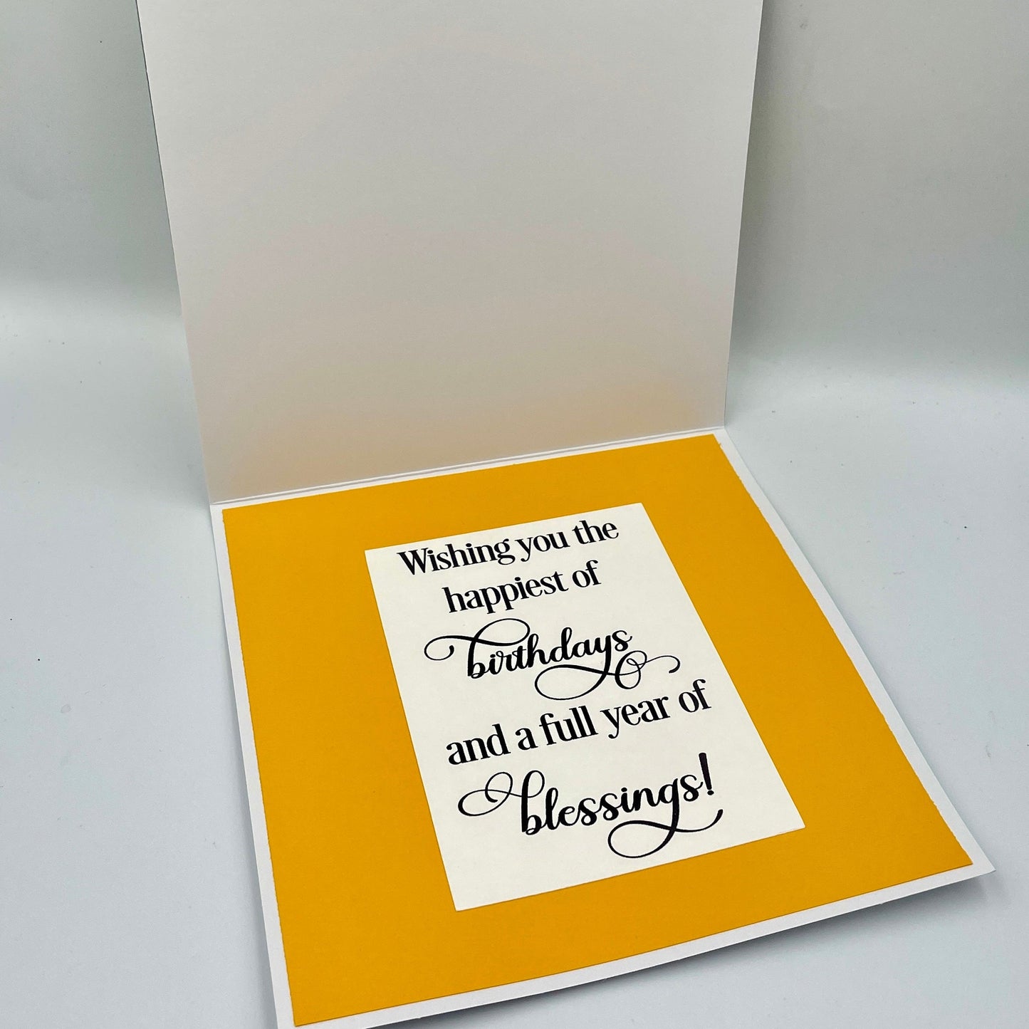 Greeting card with birthday message on a white background