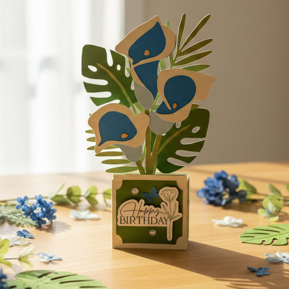 3D paper flower card with 'Happy Birthday' text on a wooden surface.