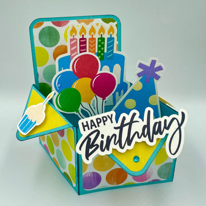 Colorful birthday card with balloons, candles, and 'Happy Birthday' text on a white background