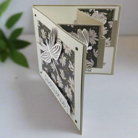 View of dragonfly card in standing position and angled to see the front and part of the inside