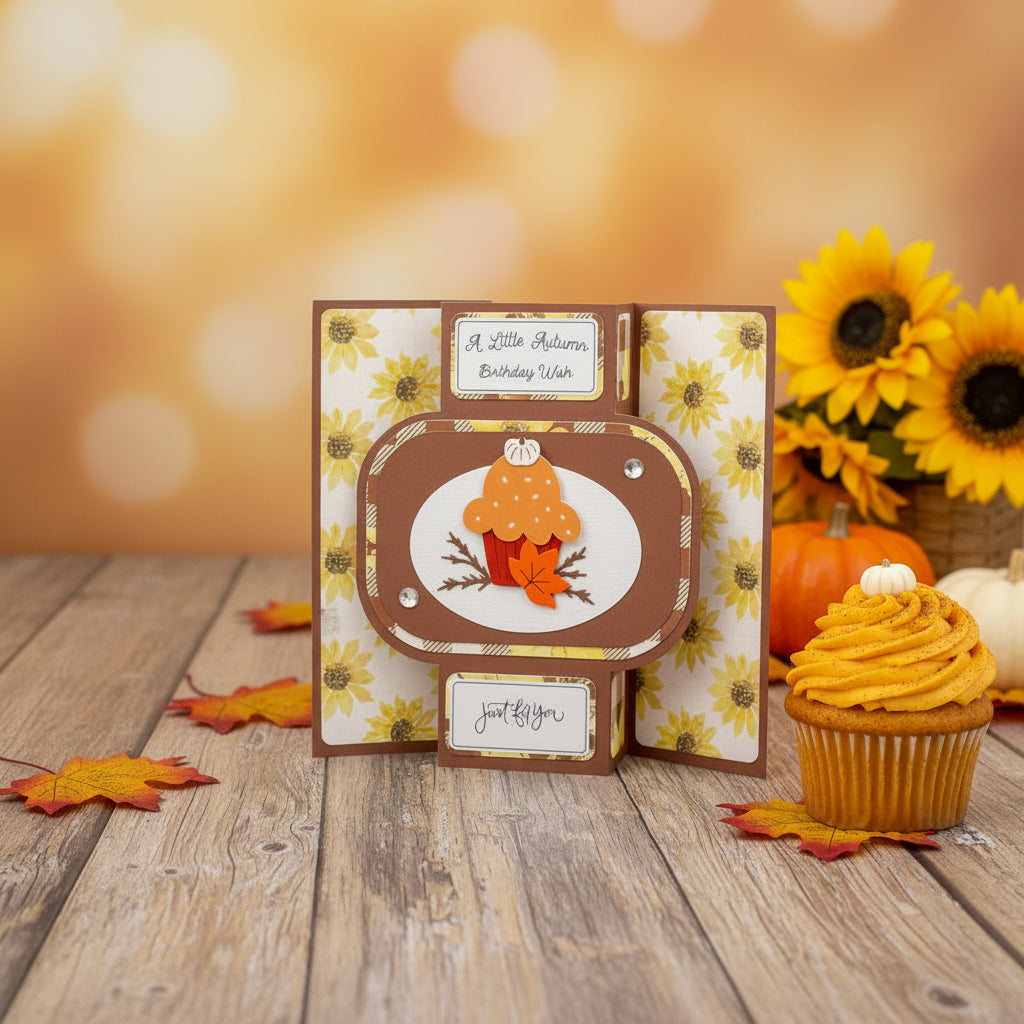 Three handmade pop-up greeting cards with autumn and cupcake designs, displayed on a white background.